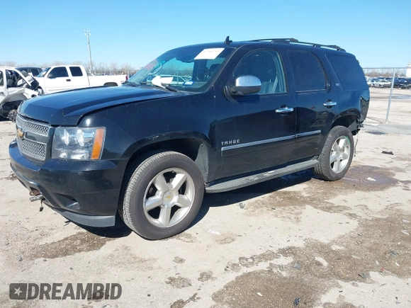 2013 Chevrolet Tahoe LTZ with VIN 1GNSKCE0XDR350970, listed as a IAAI auction lot 41704253 with 126,653 mi miles and . Bid and sale history available at DreamBid. Image 18.