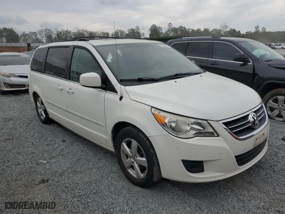 2009 Volkswagen Routan SE with VIN 2V8HW34139R582544, listed as a Copart auction lot 74354054 with 136,528 mi miles and Salvage Title. Bid and sale history available at carsss.com. Image 4.