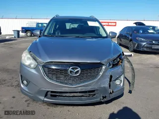 2014 Mazda CX-5 Grand Touring with VIN JM3KE2DY9E0323497, listed as a IAAI auction lot 41678360 with 216,795 mi miles. Bid and sale history available at carsss.com. Image 12.