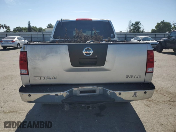 2004 Nissan Titan LE z VIN 1N6AA07B64N525238, wystawiony jako Copart lot #60370775 z przebiegiem Nie podano mil oraz Czysty tytuł • Clean title. Historia ofert i sprzedaży dostępna na DreamBid. Obrazek 6.