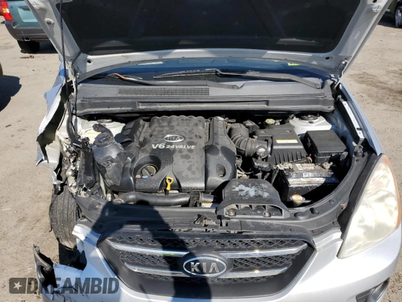 2007 Kia Rondo EX with VIN KNAFG526977104036, listed as a Copart auction lot 44372613 with 107,100 mi miles and Salvage Title. Bid and sale history available at carsss.com. Image 12.