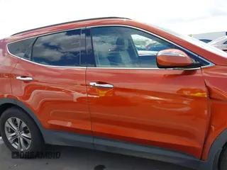 2014 Hyundai Santa Fe z VIN 5XYZUDLB4EG138898, wystawiony jako IAAI lot #42196491 z przebiegiem Nie podano mil oraz . Historia ofert i sprzedaży dostępna na DreamBid. Obrazek 13.