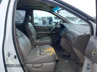 1999 Toyota Sienna LE with VIN 4T3ZF13C1XU152733, listed as a IAAI auction lot 40819395 with 184,540 mi miles. Bid and sale history available at carsss.com. Image 5.