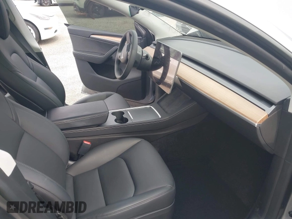 2024 Tesla Model Y Performance with VIN 7SAYGDEF3RA307468, listed as a IAAI auction lot 41805853 with 10,377 mi miles and . Bid and sale history available at DreamBid. Image 5.