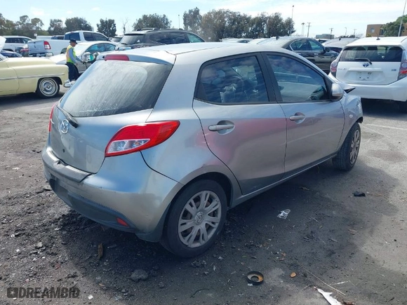 2013 Mazda Mazda2 Sport with VIN JM1DE1KZ5D0159977, listed as a IAAI auction lot 41812808 with 155,036 mi miles. Bid and sale history available at carsss.com. Image 4.