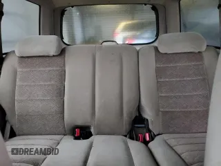 2000 Ford Explorer XLT z VIN 1FMZU73E2YZB82279, wystawiony jako Copart lot #86607864 z przebiegiem 46 620 mil mil oraz Szkody całkowita. Historia ofert i sprzedaży dostępna na DreamBid. Obrazek 10.