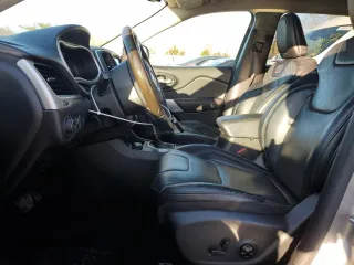 2017 Jeep Cherokee Overland with VIN 1C4PJMJS5HW665021, listed as a Copart auction lot 50872945 with 98,502 mi miles and Salvage Title. Bid and sale history available at carsss.com. Image 7.