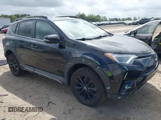 2018 Toyota RAV4 XLE with VIN 2T3RFREV1JW697044, listed as a IAAI auction lot 41891412 with 140,145 mi miles. Bid and sale history available at carsss.com. Image 1.