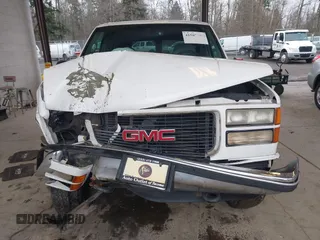 1998 GMC Yukon with VIN 1GKEK13R7WJ700881, listed as a IAAI auction lot 41507538 with 188,396 mi miles. Bid and sale history available at carsss.com. Image 12.