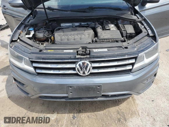 2018 Volkswagen Tiguan S z VIN 3VV1B7AX0JM068527, wystawiony jako Copart lot #51419805 z przebiegiem 86 169 mil mil oraz Szkoda całkowita • Salvage title. Historia ofert i sprzedaży dostępna na DreamBid. Obrazek 12.
