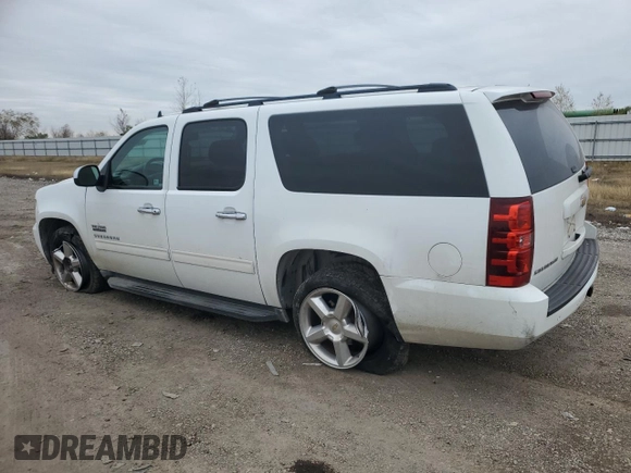 2010 Chevrolet Suburban LS with VIN 1GNUCHE05AR183058, listed as a Copart auction lot 89012175 with 236,493 mi miles and Salvage Title. Bid and sale history available at carsss.com. Image 2.