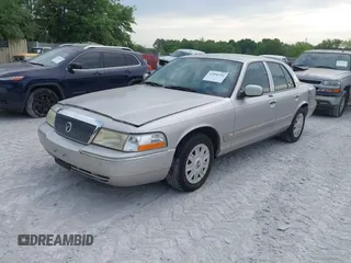 2004 Mercury Grand Marquis GS z VIN 2MEFM74W04X669087, wystawiony jako IAAI lot #42090394 z przebiegiem 172 008 mil mil oraz . Historia ofert i sprzedaży dostępna na DreamBid. Obrazek 2.