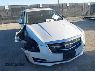 2018 Cadillac ATS RWD z VIN 1G6AA5RX4J0114084, wystawiony jako IAAI lot #41761517 z przebiegiem 104 747 mil mil oraz . Historia ofert i sprzedaży dostępna na DreamBid. Obrazek 1.
