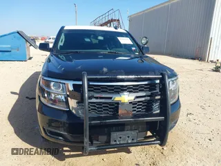 2015 Chevrolet Tahoe Commercial z VIN 1GNLC2EC7FR575386, wystawiony jako IAAI lot #41836137 z przebiegiem 143 231 mil mil oraz . Historia ofert i sprzedaży dostępna na DreamBid. Obrazek 12.