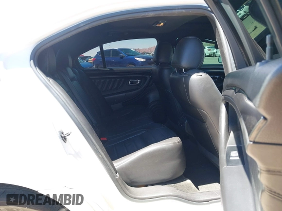2013 Ford Taurus SHO with VIN 1FAHP2KT7DG164494, listed as a IAAI auction lot 42360569 with 206,089 mi miles and . Bid and sale history available at DreamBid. Image 8.