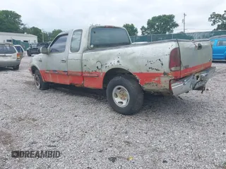 1997 Ford F-150 XL with VIN 1FTDX1869VNA33231, listed as a IAAI auction lot 42697823 with 149,986 mi miles and . Bid and sale history available at DreamBid. Image 3.