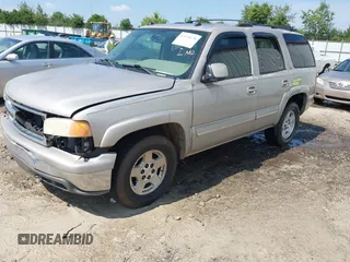 2004 Chevrolet Tahoe LT with VIN 1GNEK13Z64J292910, listed as a IAAI auction lot 42570170 with 309,679 mi miles and . Bid and sale history available at DreamBid. Image 2.