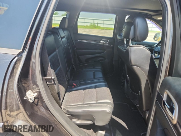 2015 Jeep Grand Cherokee High Altitude with VIN 1C4RJFCMXFC618536, listed as a Copart auction lot 64569685 with 110,982 mi miles and Clean title. Bid and sale history available at DreamBid. Image 11.