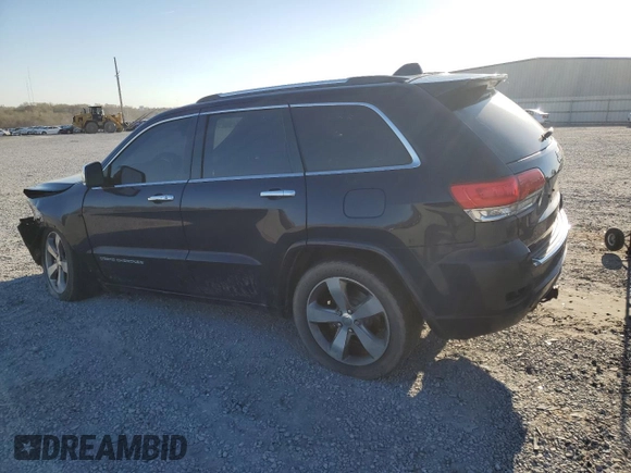 2014 Jeep Grand Cherokee Overland with VIN 1C4RJECG7EC322425, listed as a Copart auction lot 50346275 with 262,886 mi miles and Salvage Title. Bid and sale history available at carsss.com. Image 2.