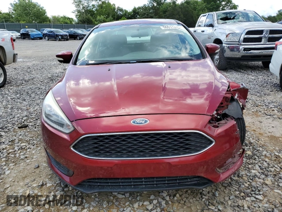 2016 Ford Focus SE z VIN 1FADP3F22GL355192, wystawiony jako Copart lot #56614225 z przebiegiem 56 214 mil mil oraz Szkoda całkowita • Salvage title. Historia ofert i sprzedaży dostępna na DreamBid. Obrazek 5.