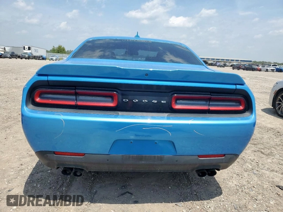 2015 Dodge Challenger SXT Plus with VIN 2C3CDZBG7FH877979, listed as a Copart auction lot 56392215 with 125,681 mi miles and Salvage title. Bid and sale history available at DreamBid. Image 6.