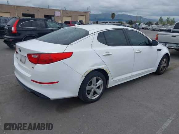 2015 Kia Optima LX with VIN KNAGM4A74F5662579, listed as a IAAI auction lot 42127251 with 144,138 mi miles and . Bid and sale history available at carsss.com. Image 4.