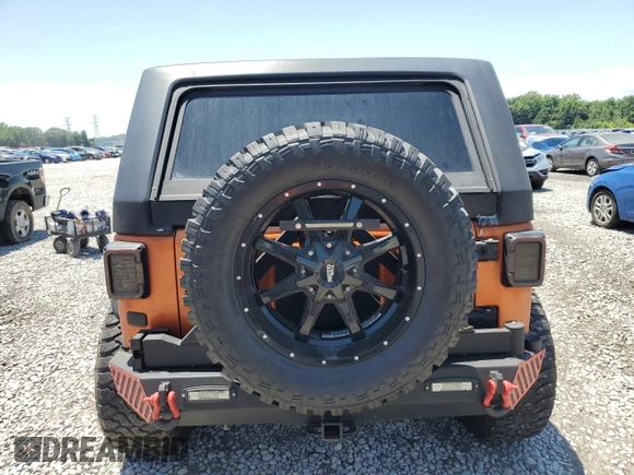 2011 Jeep Wrangler Unlimited Rubicon with VIN 1J4HA6H12BL584493, listed as a Copart auction lot 61765735 with 151,175 mi miles and Salvage title. Bid and sale history available at DreamBid. Image 6.