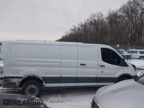 2016 Ford Transit Cargo z VIN 1FTYR2ZM7GKA78803, wystawiony jako IAAI lot #41364048 z przebiegiem 118 833 mil mil oraz . Historia ofert i sprzedaży dostępna na DreamBid. Obrazek 14.