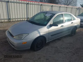 2001 Ford Focus LX with VIN 1FAFP33P21W309425, listed as a IAAI auction lot 41482071 with 86,943 mi miles and . Bid and sale history available at carsss.com. Image 2.