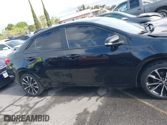 2019 Toyota Corolla L with VIN 5YFBURHE6KP892992, listed as a IAAI auction lot 42057187 with 80,304 mi miles and . Bid and sale history available at DreamBid. Image 13.