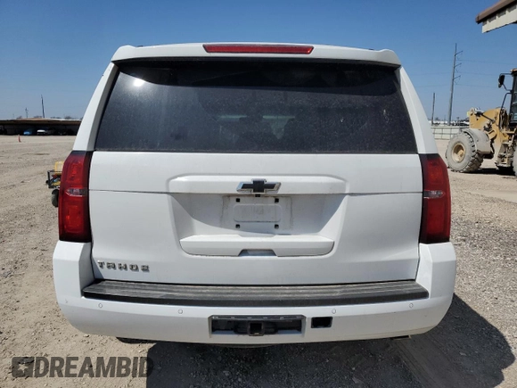 2020 Chevrolet Tahoe LT с VIN 1GNSCBKC8LR308690, выставлен на аукционе Copart как лот 49348265 с пробегом 128 203 миль миль и Списание • Salvage title. История ставок и продаж доступна на DreamBid. Изображение 6.