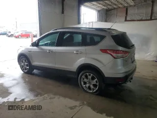 2014 Ford Escape SE z VIN 1FMCU9G97EUC43696, wystawiony jako Copart lot #57409665 z przebiegiem 68 586 mil mil oraz Czysty tytuł • Clean title. Historia ofert i sprzedaży dostępna na DreamBid. Obrazek 2.