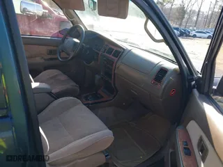 1997 Toyota 4Runner SR5 with VIN JT3GN86RXV0021552, listed as a IAAI auction lot 41493321 with 220,487 mi miles. Bid and sale history available at carsss.com. Image 5.