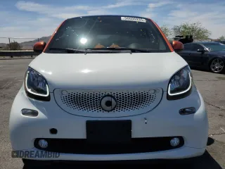 2016 Smart fortwo Passion z VIN WMEFJ5DA6GK075566, wystawiony jako Copart lot #56606935 z przebiegiem 47 733 mil mil oraz Szkody całkowita. Historia ofert i sprzedaży dostępna na DreamBid. Obrazek 5.