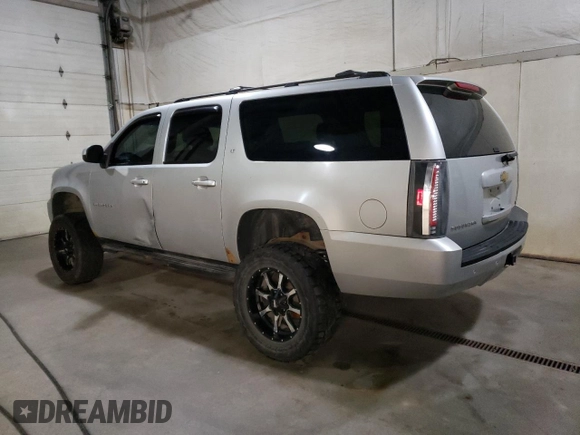2011 Chevrolet Suburban LT z VIN 1GNSKJE34BR341094, wystawiony jako Copart lot #53376515 z przebiegiem 187 219 mil mil oraz Czysty tytuł • Clean title. Historia ofert i sprzedaży dostępna na DreamBid. Obrazek 2.