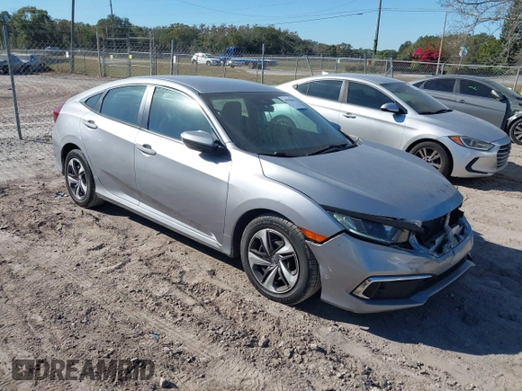 2020 Honda Civic LX with VIN 19XFC2F62LE009433, listed as a IAAI auction lot 40963670 with 117,865 mi miles and . Bid and sale history available at DreamBid. Image 1.