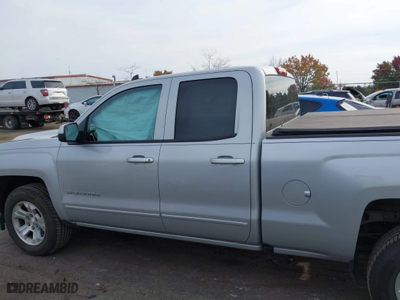 2018 Chevrolet Silverado 1500 LT with VIN 1GCVKREH9JZ362330, listed as a IAAI auction lot 40738418 with 77,814 mi miles. Bid and sale history available at carsss.com. Image 14.