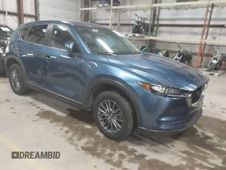 2019 Mazda CX-5 Touring with VIN JM3KFBCM1K0584369, listed as a IAAI auction lot 41657765 with 77,934 mi miles. Bid and sale history available at carsss.com. Image 1.