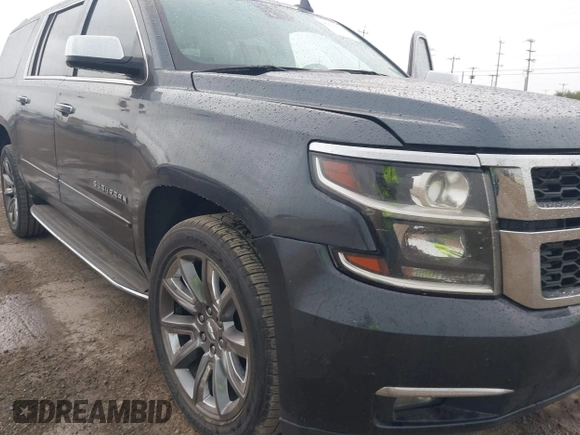 2020 Chevrolet Suburban Premier with VIN 1GNSCJKC8LR290783, listed as a IAAI auction lot 42636126 with 59,371 mi miles and . Bid and sale history available at DreamBid. Image 6.