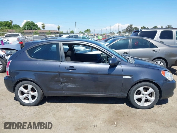 2007 Hyundai Accent SE with VIN KMHCN36C37U031369, listed as a IAAI auction lot 42093760 with 95,919 mi miles. Bid and sale history available at carsss.com. Image 13.