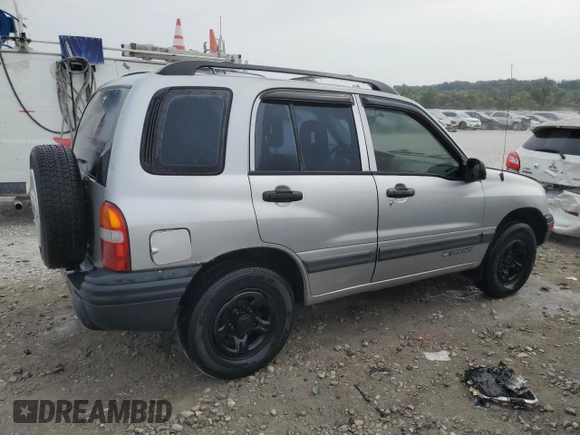 2002 Chevrolet Tracker with VIN 2CNBE13C926934704, listed as a Copart auction lot 70717194 with 189,076 mi miles and Salvage title. Bid and sale history available at DreamBid. Image 3.