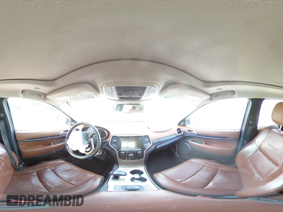 2015 Jeep Grand Cherokee Summit with VIN 1C4RJFJG3FC849534, listed as a Copart auction lot 53039595 with 155,567 mi miles and Salvage Title. Bid and sale history available at DreamBid. Image 14.