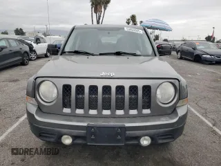 2014 Jeep Patriot Altitude with VIN 1C4NJPBAXED595327, listed as a Copart auction lot 53665005 with 134,771 mi miles and Salvage Title. Bid and sale history available at DreamBid. Image 5.