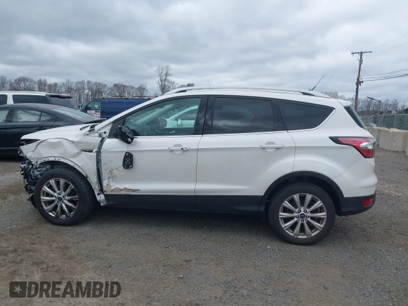 2018 Ford Escape Titanium with VIN 1FMCU9J90JUD53380, listed as a IAAI auction lot 42042802 with 30,371 mi miles and . Bid and sale history available at DreamBid. Image 15.