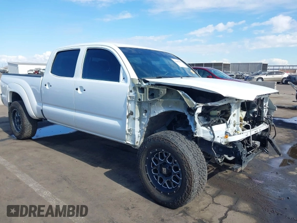 2014 Toyota Tacoma with VIN 3TMMU4FN9EM062808, listed as a IAAI auction lot 41450058 with 192,628 mi miles and . Bid and sale history available at DreamBid. Image 6.