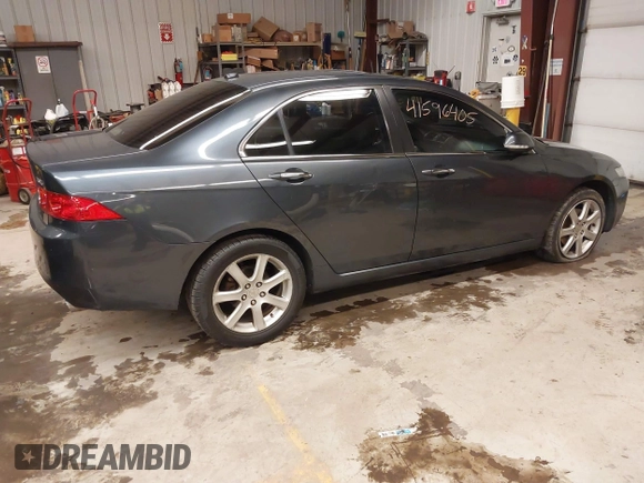 2005 Acura TSX with VIN JH4CL96975C034682, listed as a IAAI auction lot 41596405 with 228,889 mi miles and . Bid and sale history available at DreamBid. Image 13.