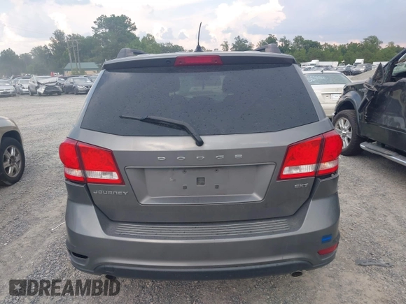 2013 Dodge Journey SXT with VIN 3C4PDCBG7DT568284, listed as a IAAI auction lot 42508928 with 215,803 mi miles and . Bid and sale history available at DreamBid. Image 16.