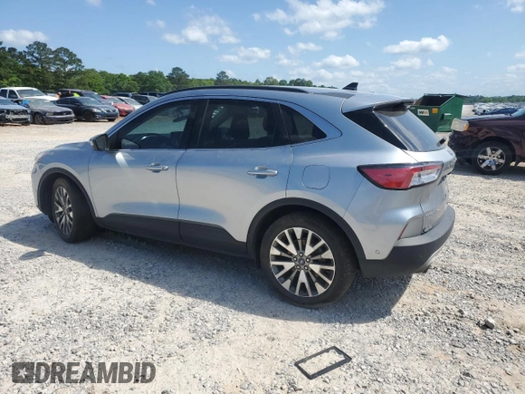 2021 Ford Escape Titanium Hybrid with VIN 1FMCU0DZXMUA78550, listed as a Copart auction lot 53389595 with 104,371 mi miles and Salvage title. Bid and sale history available at DreamBid. Image 2.