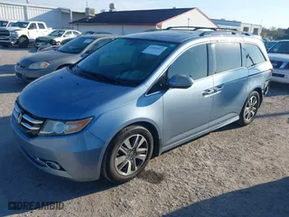 2014 Honda Odyssey Touring with VIN 5FNRL5H98EB102430, listed as a IAAI auction lot 41683822 with 185,802 mi miles. Bid and sale history available at carsss.com. Image 19.
