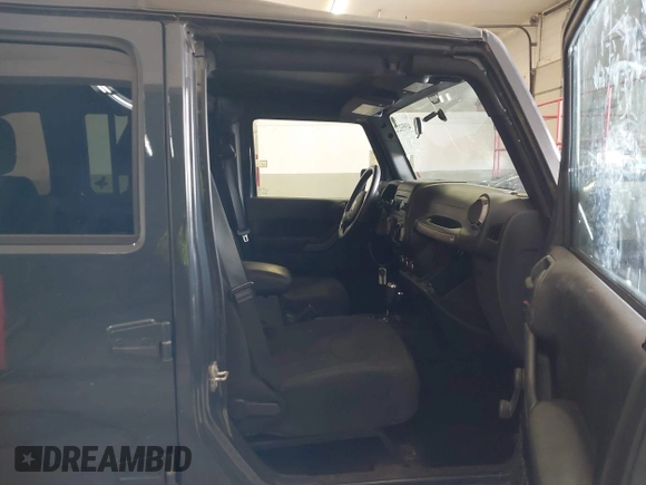 2017 Jeep Wrangler Unlimited Sport with VIN 1C4BJWDG3HL503676, listed as a IAAI auction lot 41953232 with 94,819 mi miles. Bid and sale history available at carsss.com. Image 5.